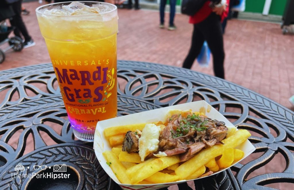 2024 Mardi Gras at Universal Studios Florida Maple Smash and Short Rib Beef Poutine at Canada Food Booth. One of the best things to eat at Universal Mardi Gras.