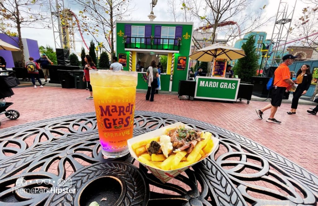 2025 Mardi Gras at Universal Studios Florida Maple Smash and Short Rib Beef Poutine at Canada Food Booth. One of the best things to eat at Universal Mardi Gras.
