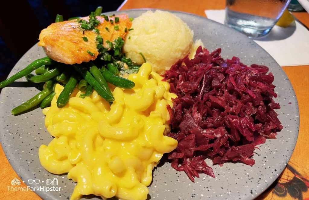 Epcot Theme Park Disney World Akershus Royal Banquet Hall Restaurant in Norway Pavilion salmon mac and cheese beans and potatoes