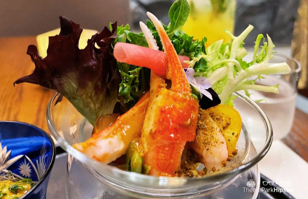 Epcot Theme Park in Disney Japan Pavilion Takumi Tei Seasonal Seafood dish with lobster claw.  One of the best Restaurants at Epcot.