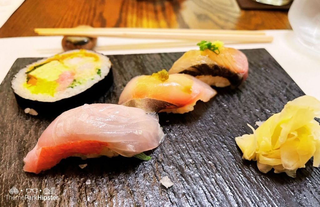 Epcot Theme Park in Disney Japan Pavilion Takumi Tei second course with sushi roll and nigiri.  One of the best Restaurants at Epcot.