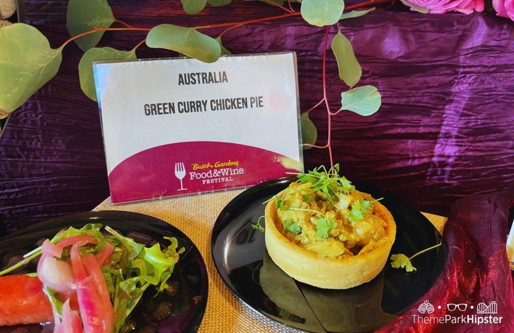 Busch Gardens Tampa 2024 Food and Wine Festival Australia Green Curry Chicken Pie Watermelon Salad. One of the best things to eat at Busch Gardens Food and Wine Festival.