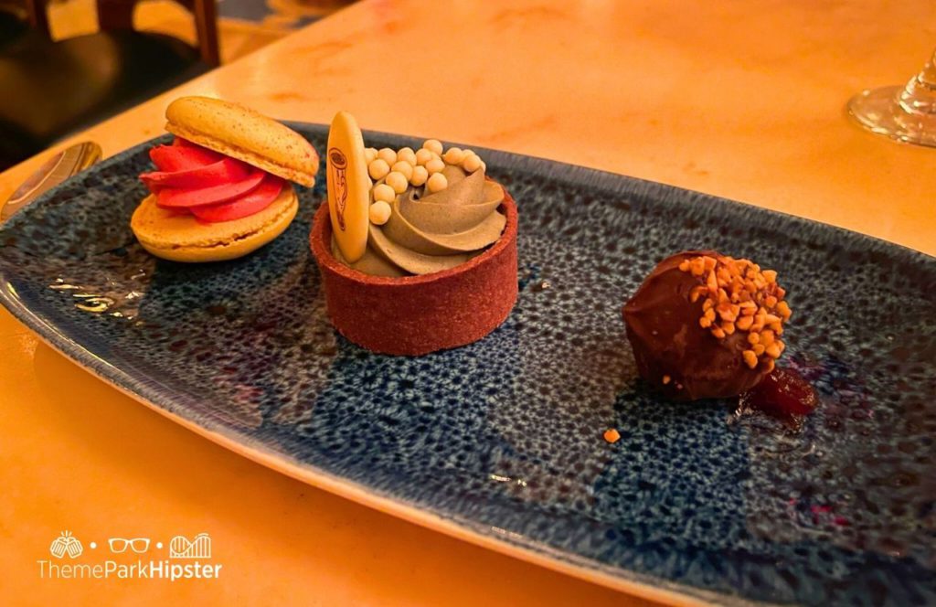 Disney Magic Kingdom Park Fantasyland Beast Castle Be Our Guest Restaurant with Grey Stuff Dessert and Macaron