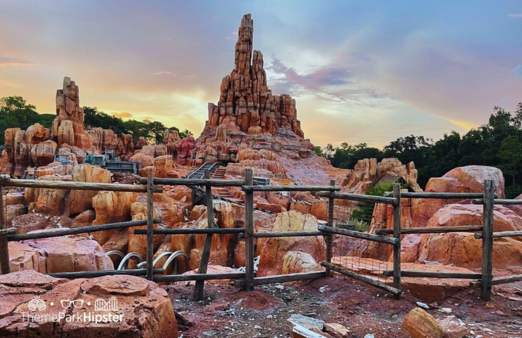 Disney Magic Kingdom Park Frontierland Big Thunder Mountain Railroad Roller Coaster at Sunset. Choose this Disney park when figuring out how many days at Disney World and if 4 days is enough for Disney World.