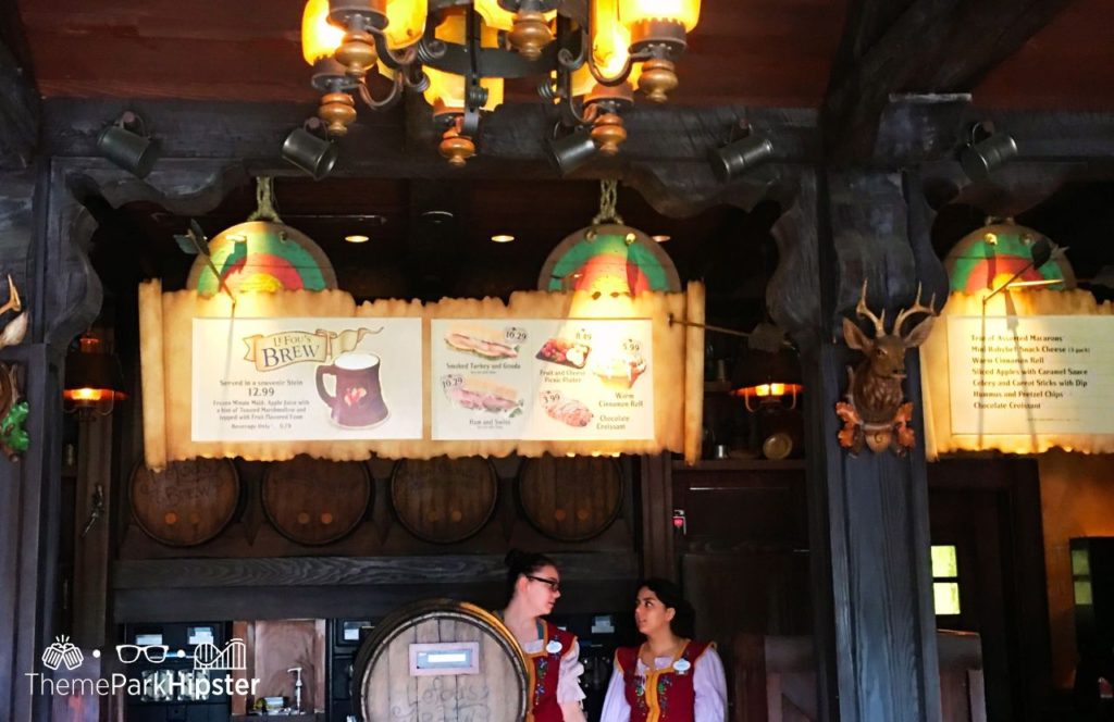 Disney Magic Kingdom Park Gaston's Tavern in Fantasyland Menu with Warm Cinnamon Roll