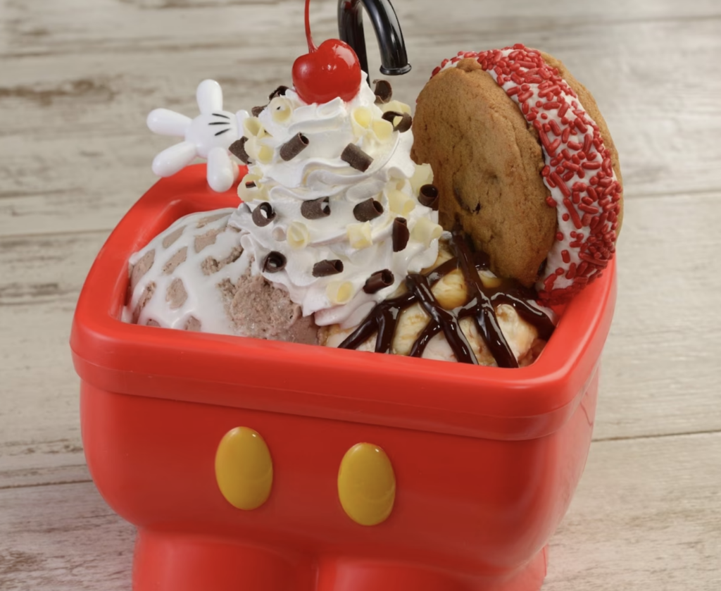 Mickey Sink Sundae Ice Cream with vanilla and chocolate topped with whipped cream and cookies at Disney World at the The Plaza Ice Cream Parlor in Magic Kingdom Theme Park.