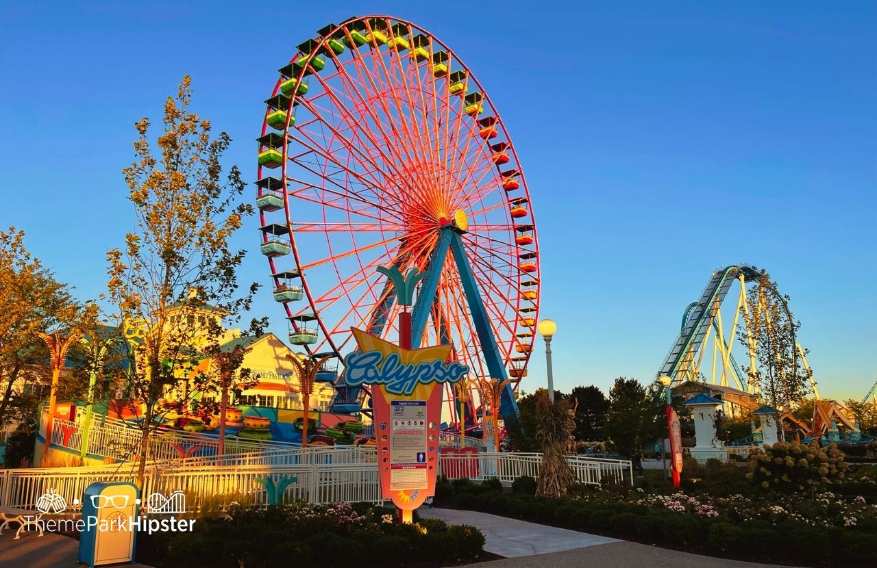 Ultimate Guide and Tips to Cedar Point Ohio Amusement Park Calypso Ride with Ferris Wheel and Gatekeeper roller coaster in the background