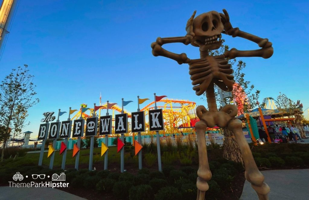 Cedar Point Ohio Amusement Park The Bone Walk Boardwalk with Wild Mouse Roller Coaster at Halloweekends Skull decor