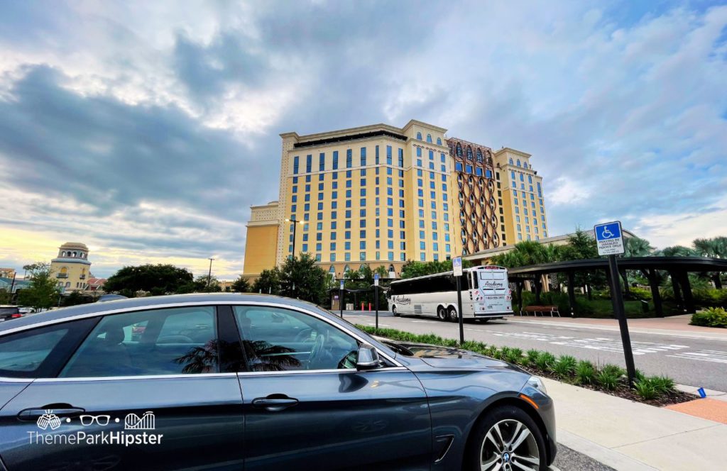 Destino Tower Lobby on cloudy rainy day parking lot Toledo Restaurant at Disney's Coronado Springs Resort. One of the Best Disney World Transportation options.