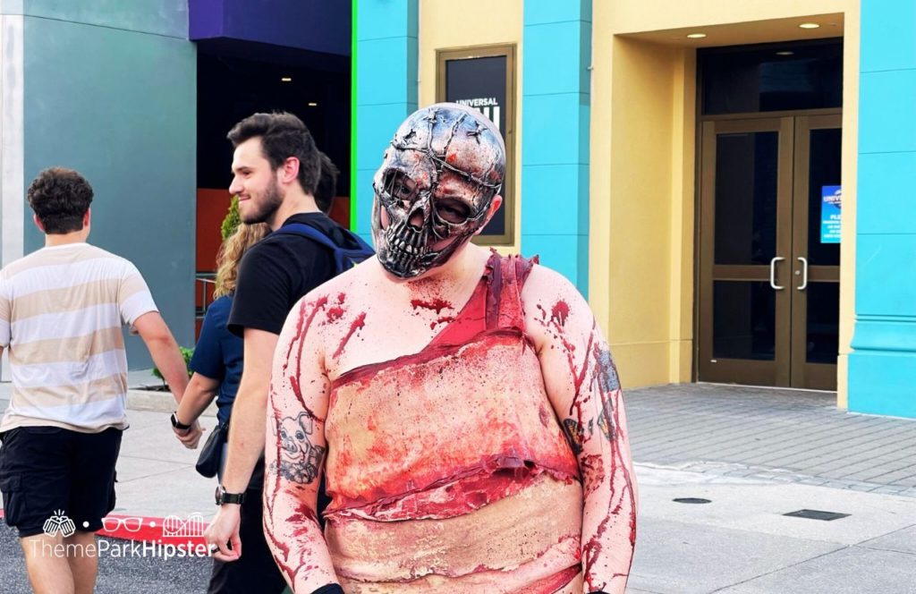 Duality of Fear Scare Zone with Chainsaw Guy at HHN 33 Halloween Horror Nights at Universal Studios Orlando Florida