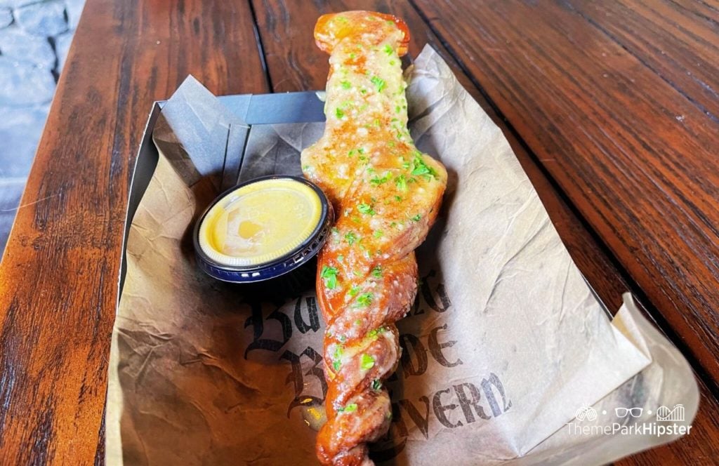 Universal Epic Universe Theme Park Dark Universe Darkmoor The Burning Blade Tavern Hunter’s Garlic Stake. Keep reading for the full guide to The Burning Blade Tavern in Epic Universe. 