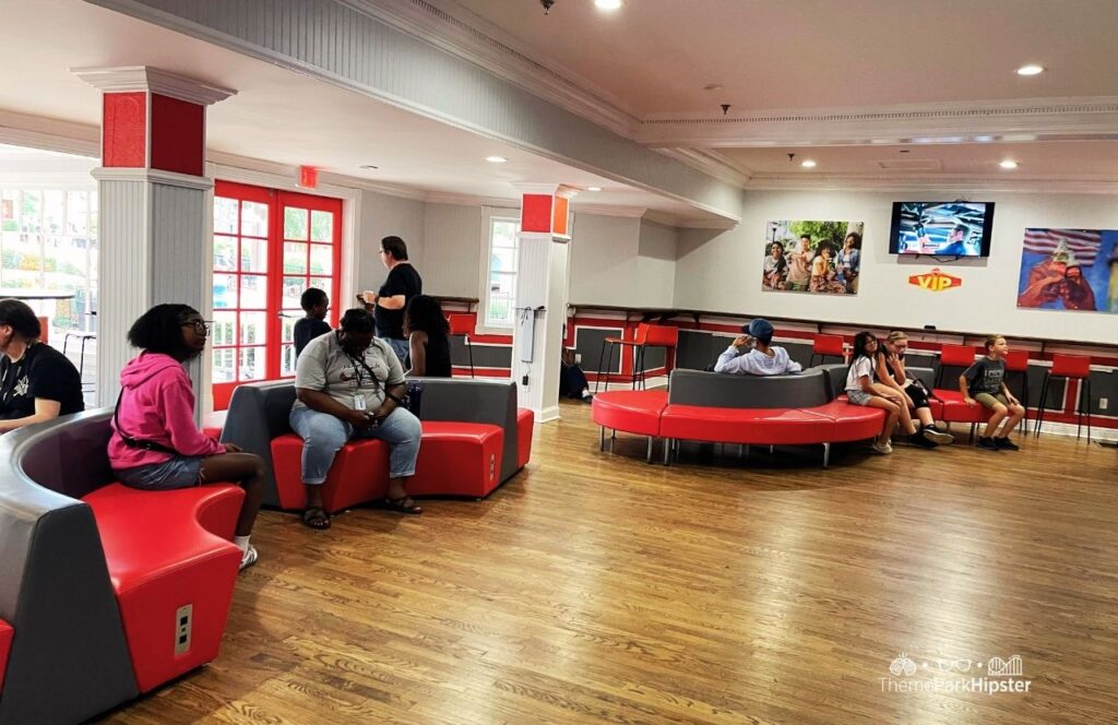 Six Flags Over Georgia Amusement Park Annual Pass Member VIP Lounge with People resting on Couches. Keep reading to find out everything you need to know about visiting Six Flags Over Georgia for the first time.