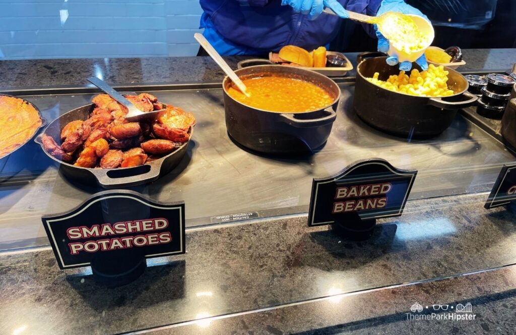 Six Flags Over Georgia Amusement Park Firehouse BBQ Restaurant Smashed Potatoes Baked Beans and Mac and Cheese. Keep reading to find out everything you need to know about visiting Six Flags Over Georgia for the first time.