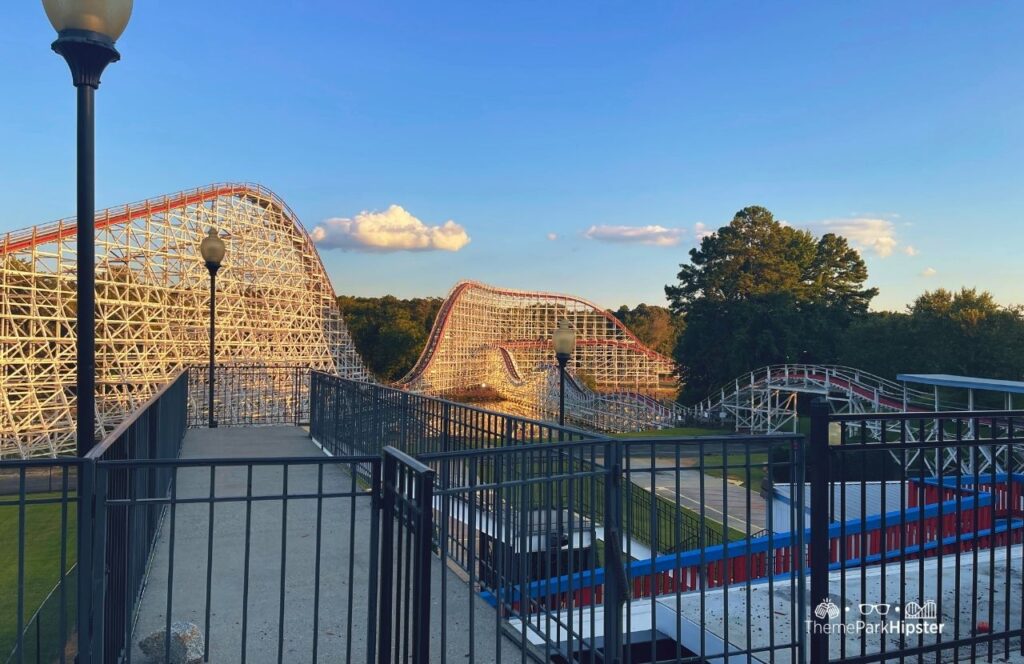 Six Flags Over Georgia Amusement Park The Great American Scream Machine Wooden Roller Coaster. Keep reading to find out everything you need to know about visiting Six Flags Over Georgia for the first time.