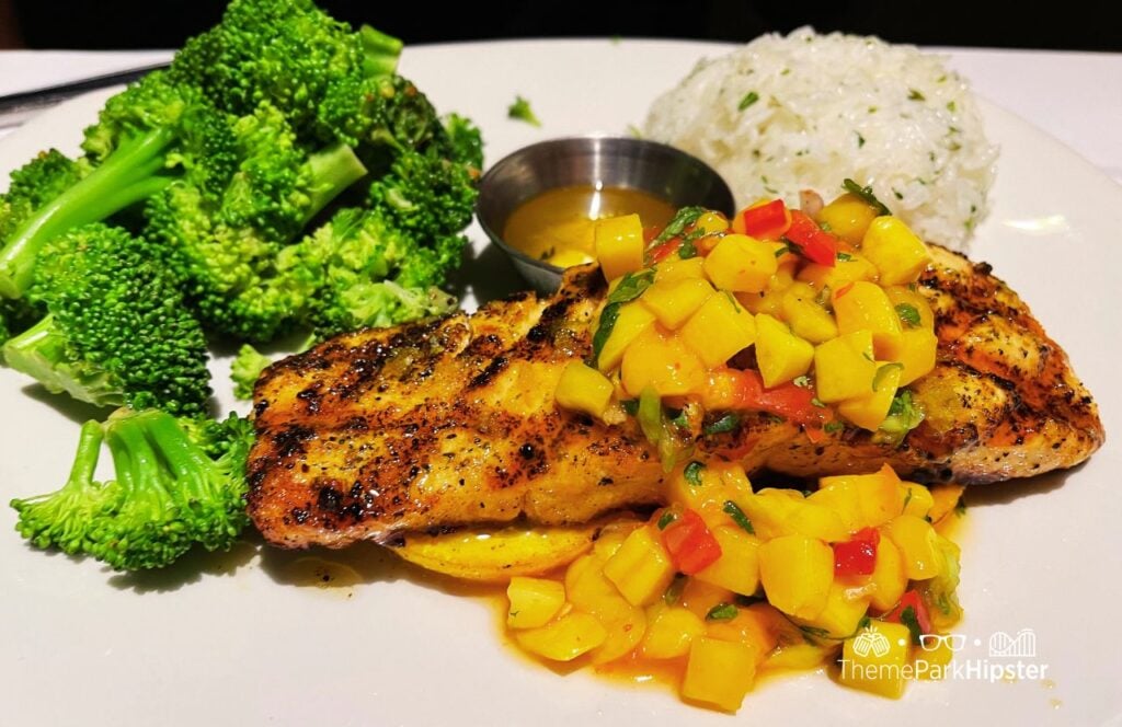 Salmon topped with Mango salsa broccoli and white rice Bonefish Grill Restaurant Special Events
