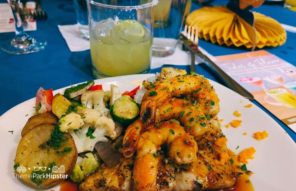 Tides of Flavor 5 Course Meal Parker's Margarita with Unicorn Fish topped with shrimp and mixed vegetables Bonefish Grill Restaurant Special Events