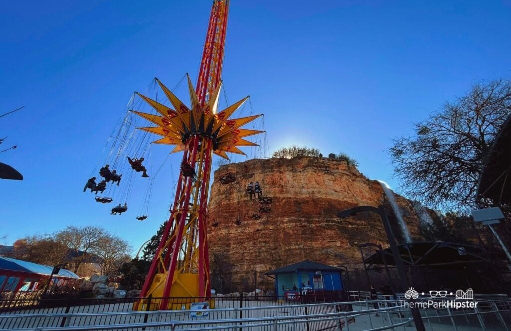 SuperGirl Sky Flight Swing Quarry Wall Six Flags Fiesta Texas Theme Park San Antonio